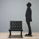 Vintage armchair in metal and black faux leather, Italian design from the 1970s.