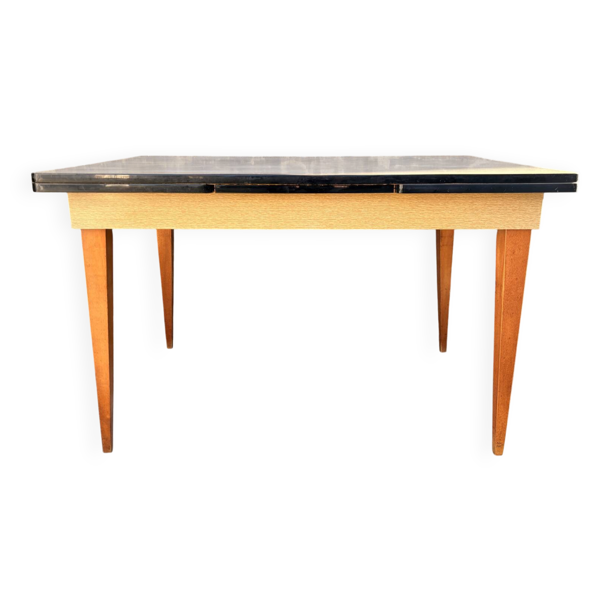 Beige French modernist extendable table, wooden legs, circa 1955.