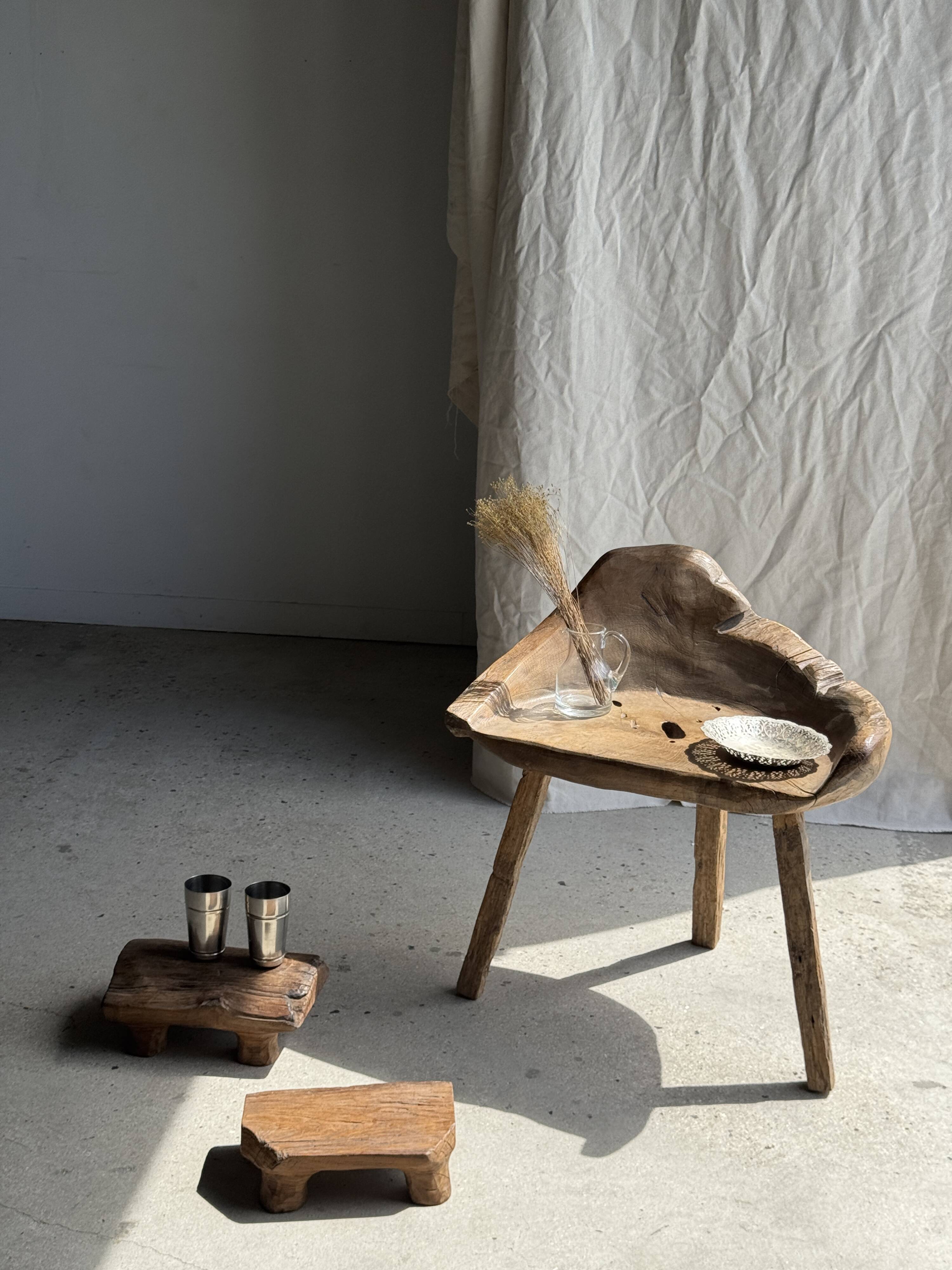 Small stool, teak footrest with short cut corners.