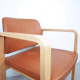 Fauteuil en cuir et en bois 1990
