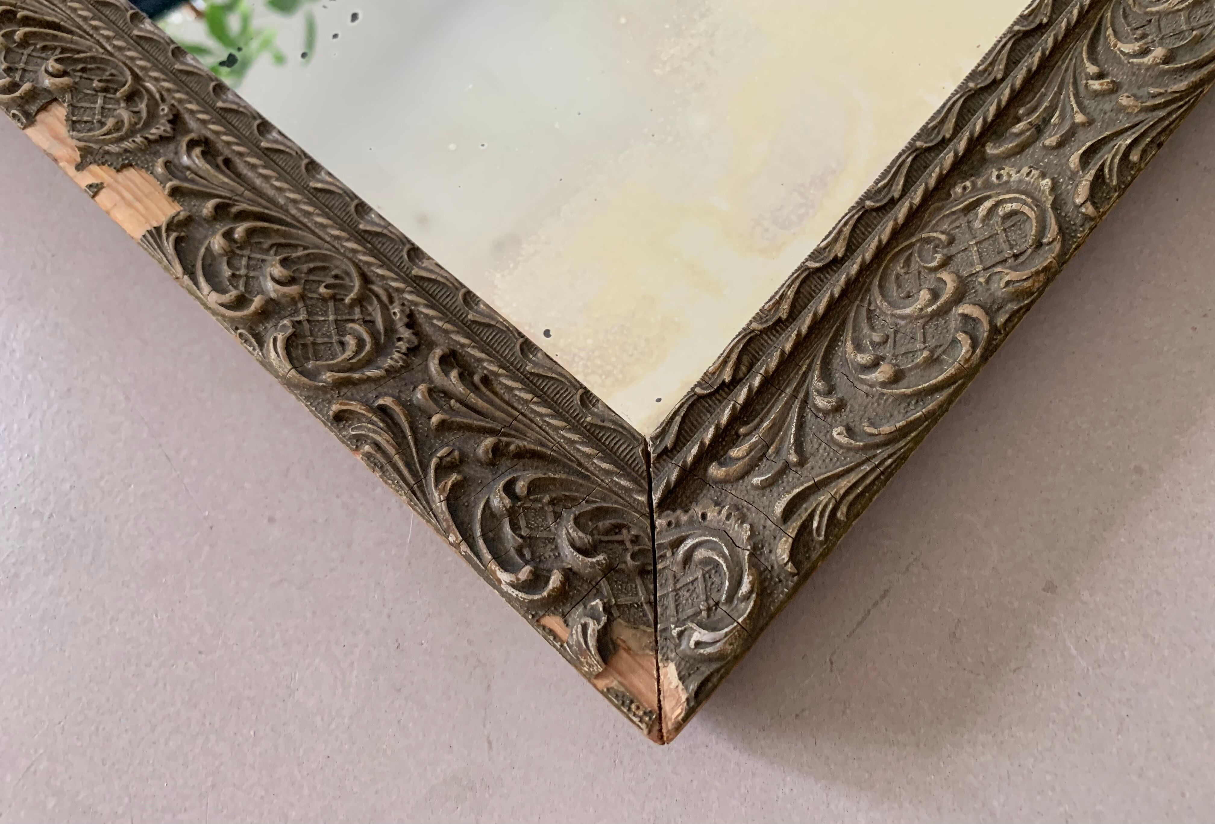 Old stitched golden mirror