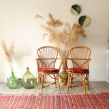 Ensemble de 2 chaises Audoux-Minnet en rotin années 60