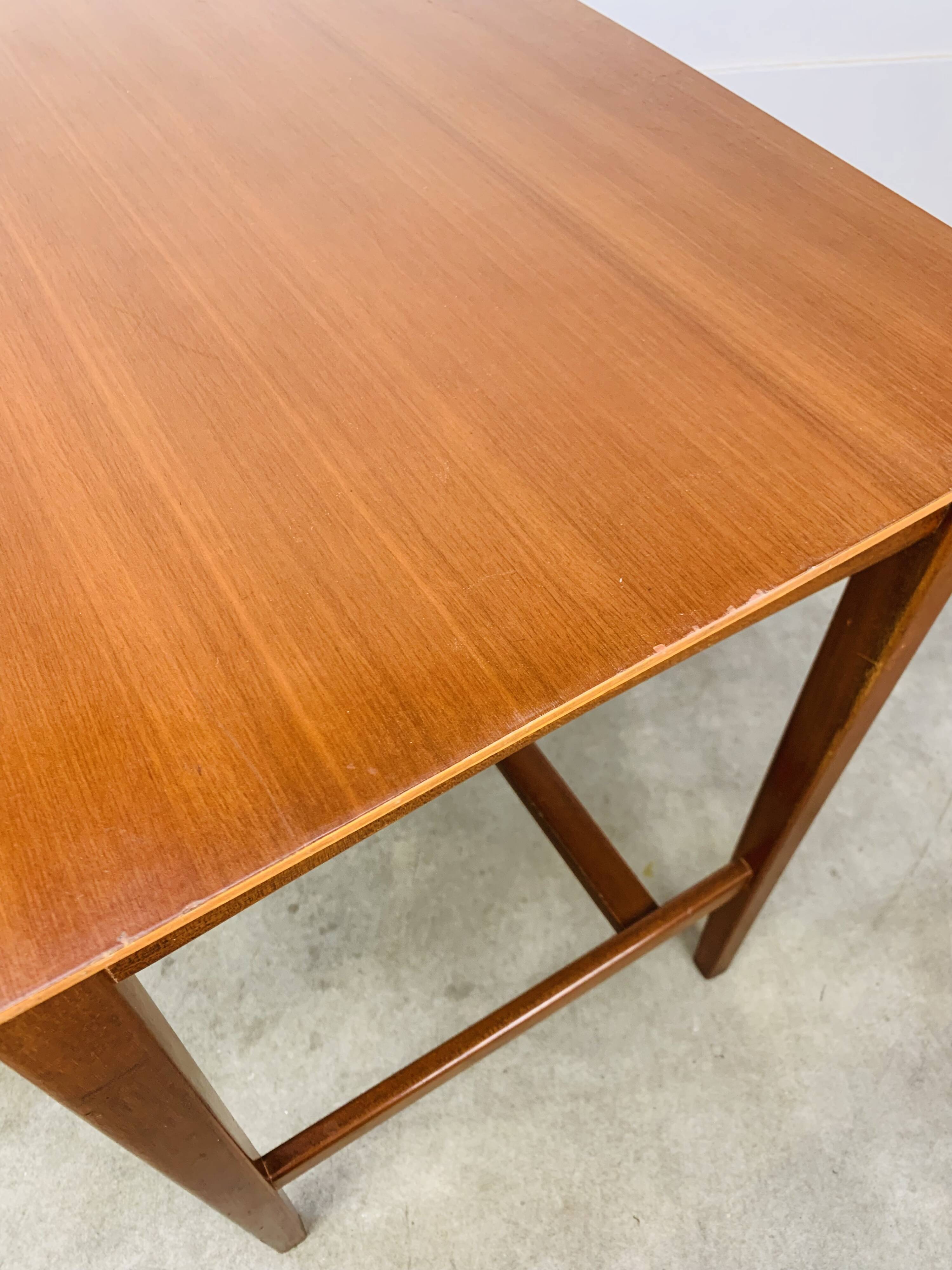 Minimalist Scandinavian teak desk from the 1960s, vintage.