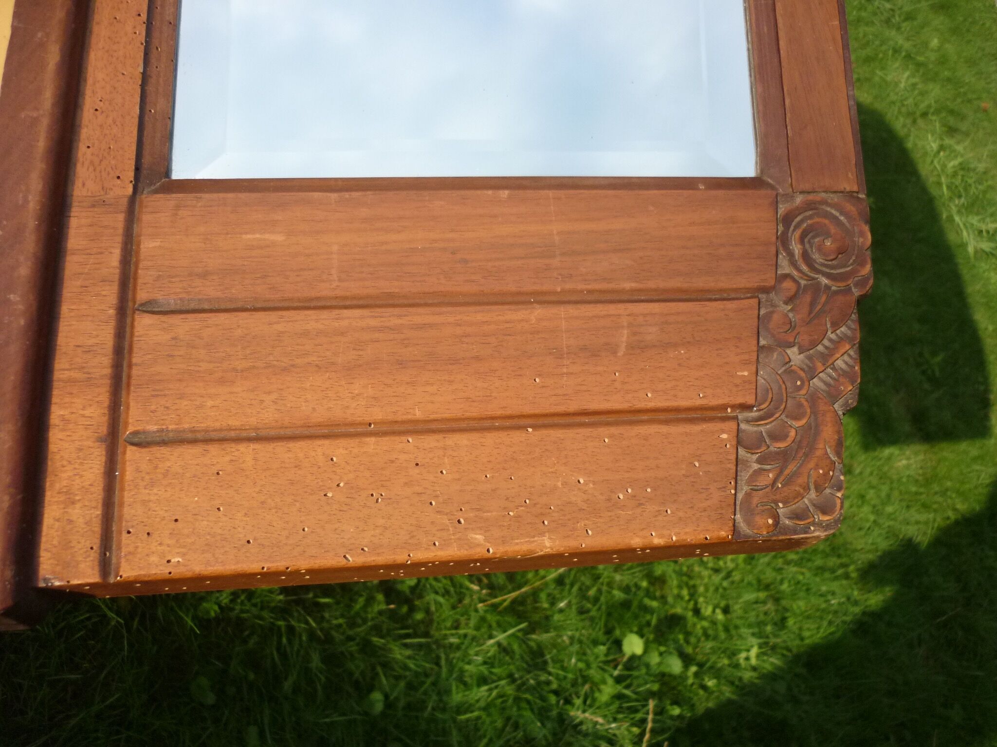 Low mirror in a carved wooden art-deco 1930 112x36cm