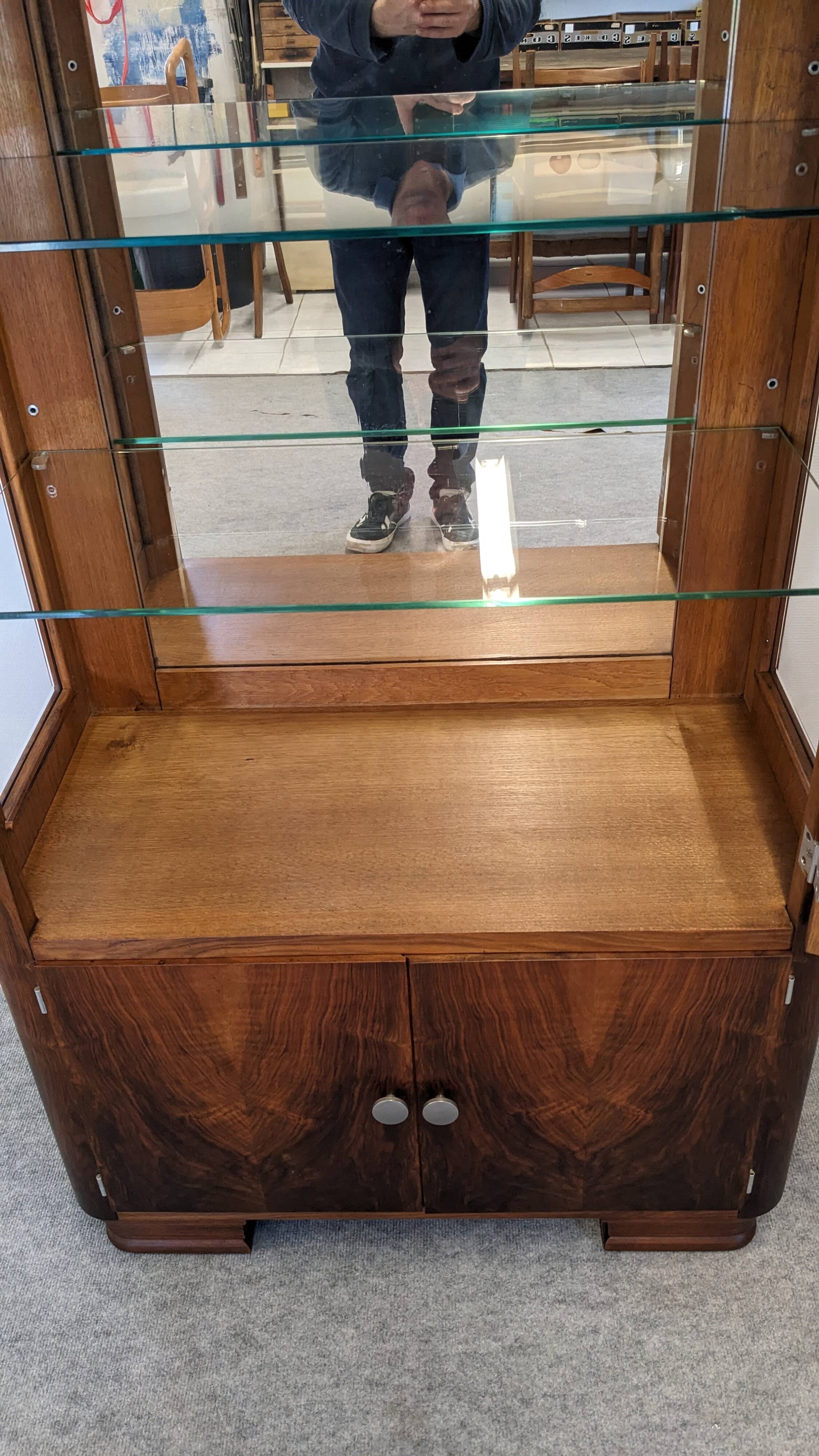 Art Deco walnut burl display cabinet, France circa 1930.