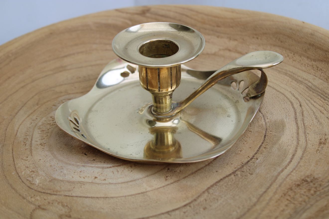 Golden brass candle holder