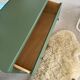Vintage olive green chest of drawers with striped base