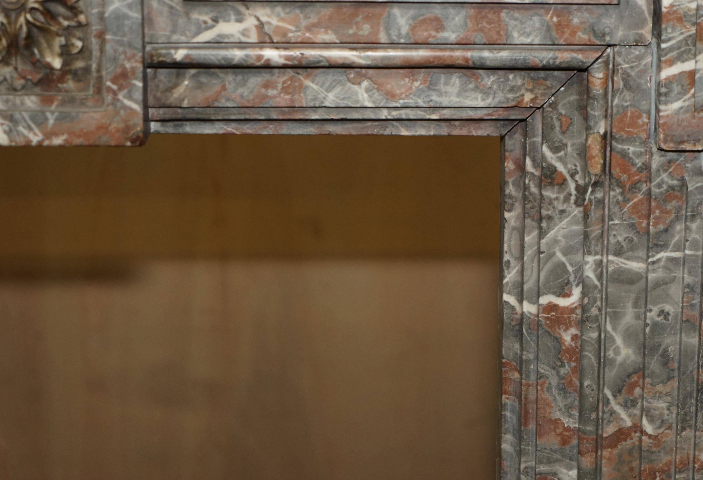 Antique marble fireplace in Saint Remy, Louis XVI style.
