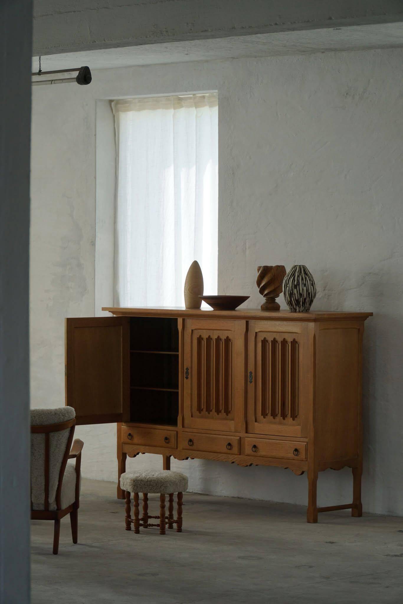 Brutalist oak sideboard, mid-century Danish design, Kjærnulf style, 1960s.