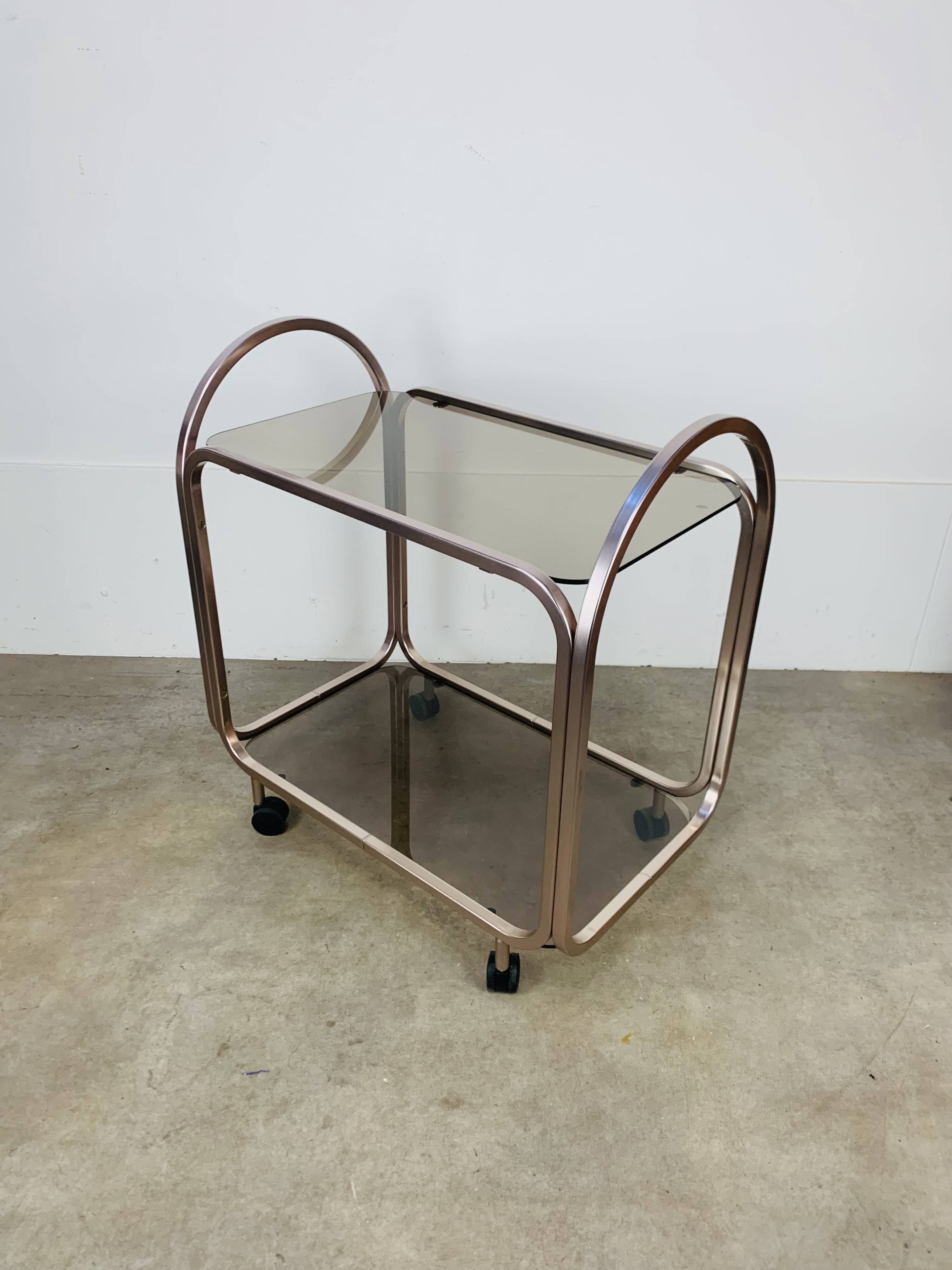 Kaymet dessert trolley in smoked glass and anodised aluminium, 1980s.