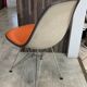 Eames Herman Miller DSR Eiffel chair in orange greige fibreglass and skai.