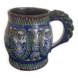 Choppe in polychrome earthenware twisted handle