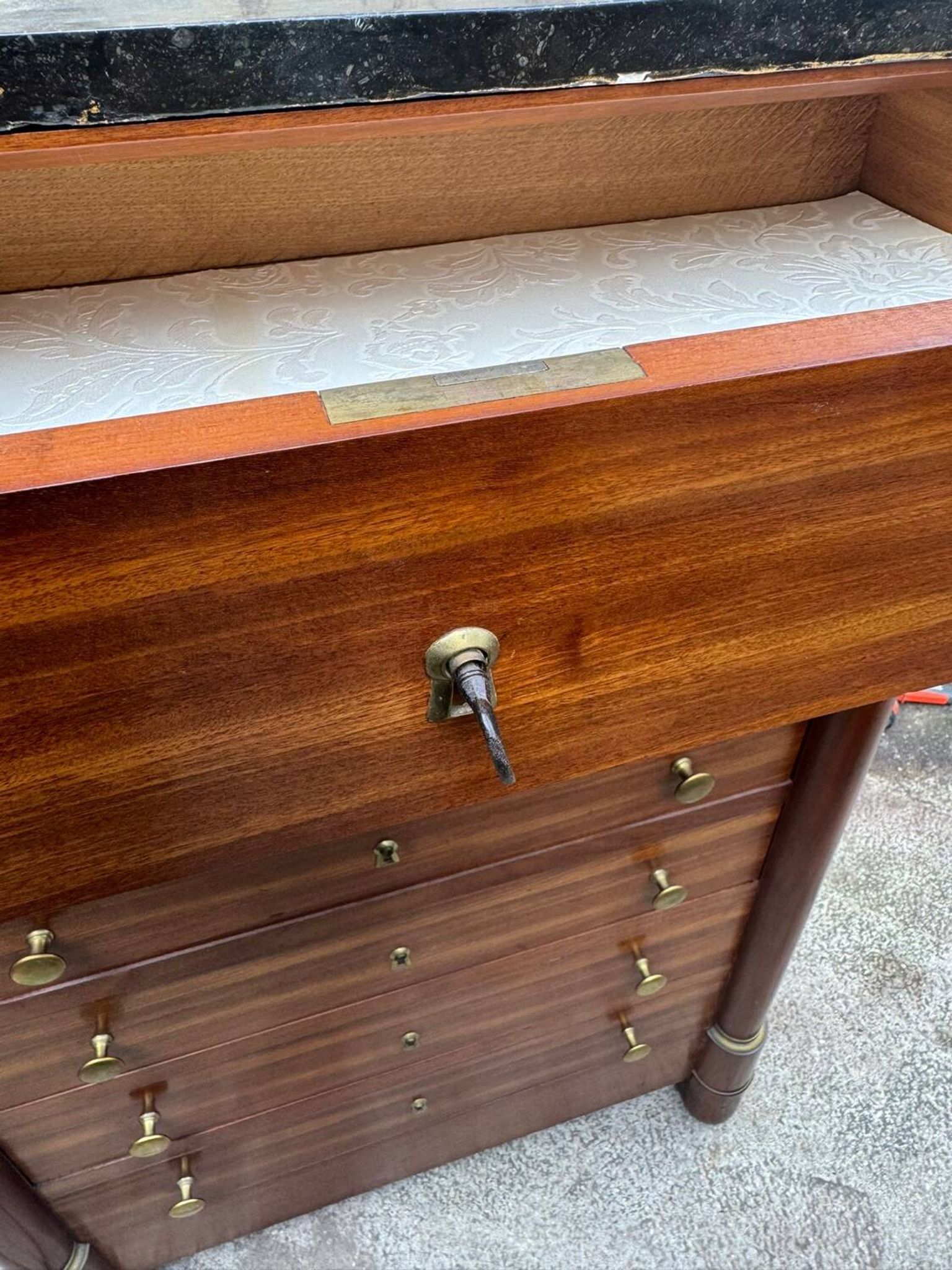 Empire chest of drawers in mahogany and black marble, 19th century
