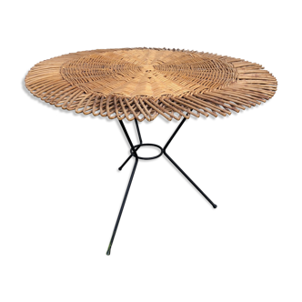 Rattan coffee table with black metal base
