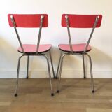 Duo of red formica chairs