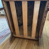 Vintage leather club chair with wooden armrests