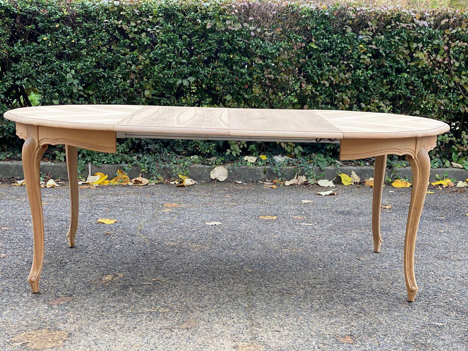 Louis XV style oval extendable round table renovated in raw wood