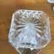Mismatched decanter and whiskey glasses