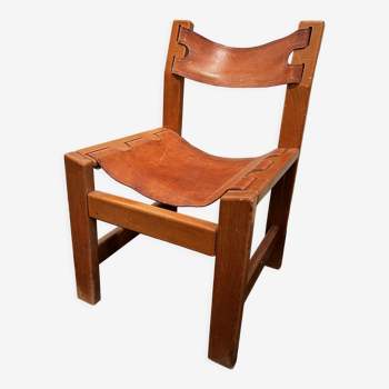 Wood and leather armchair