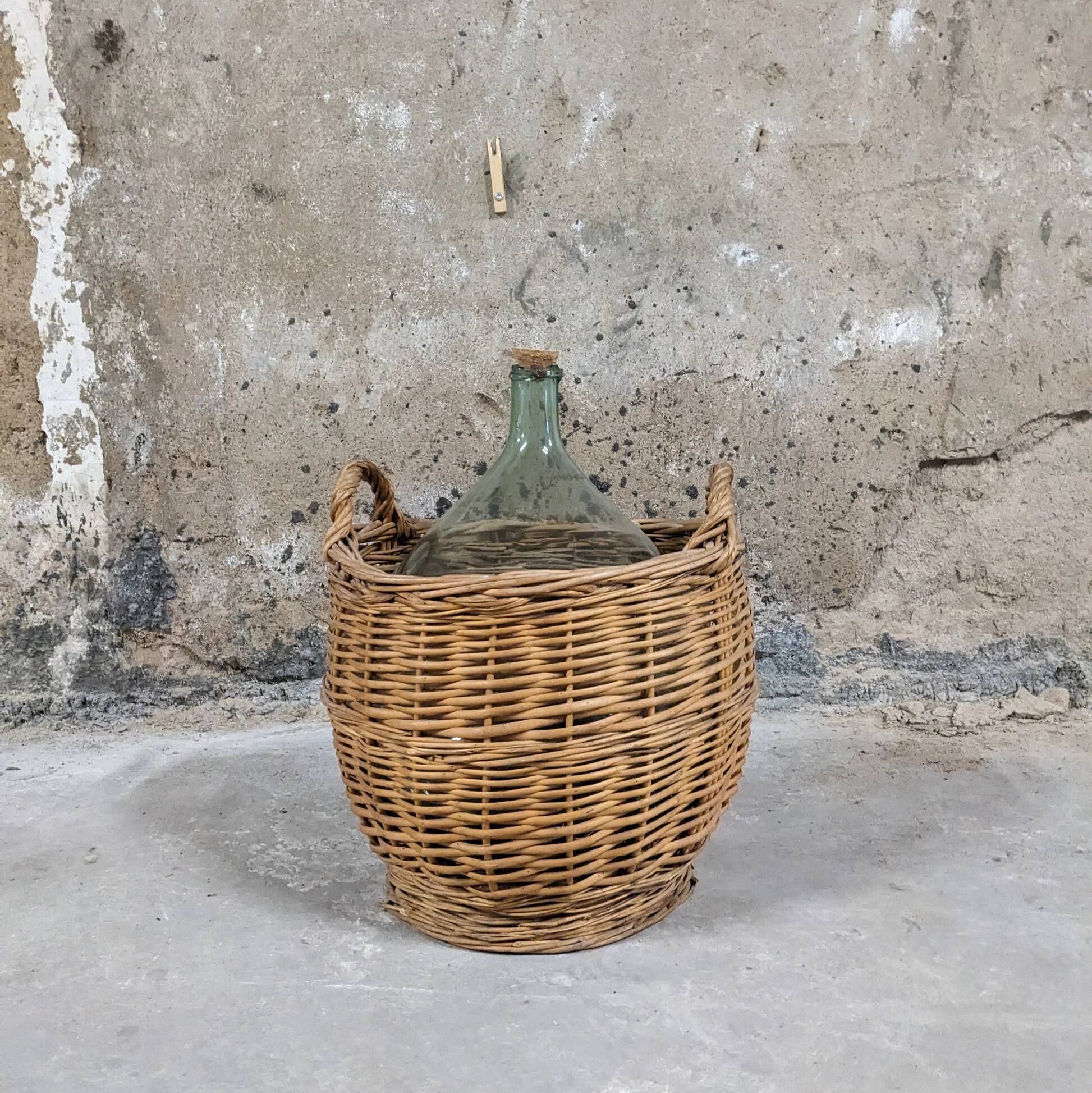 Demijohn in its wicker basket