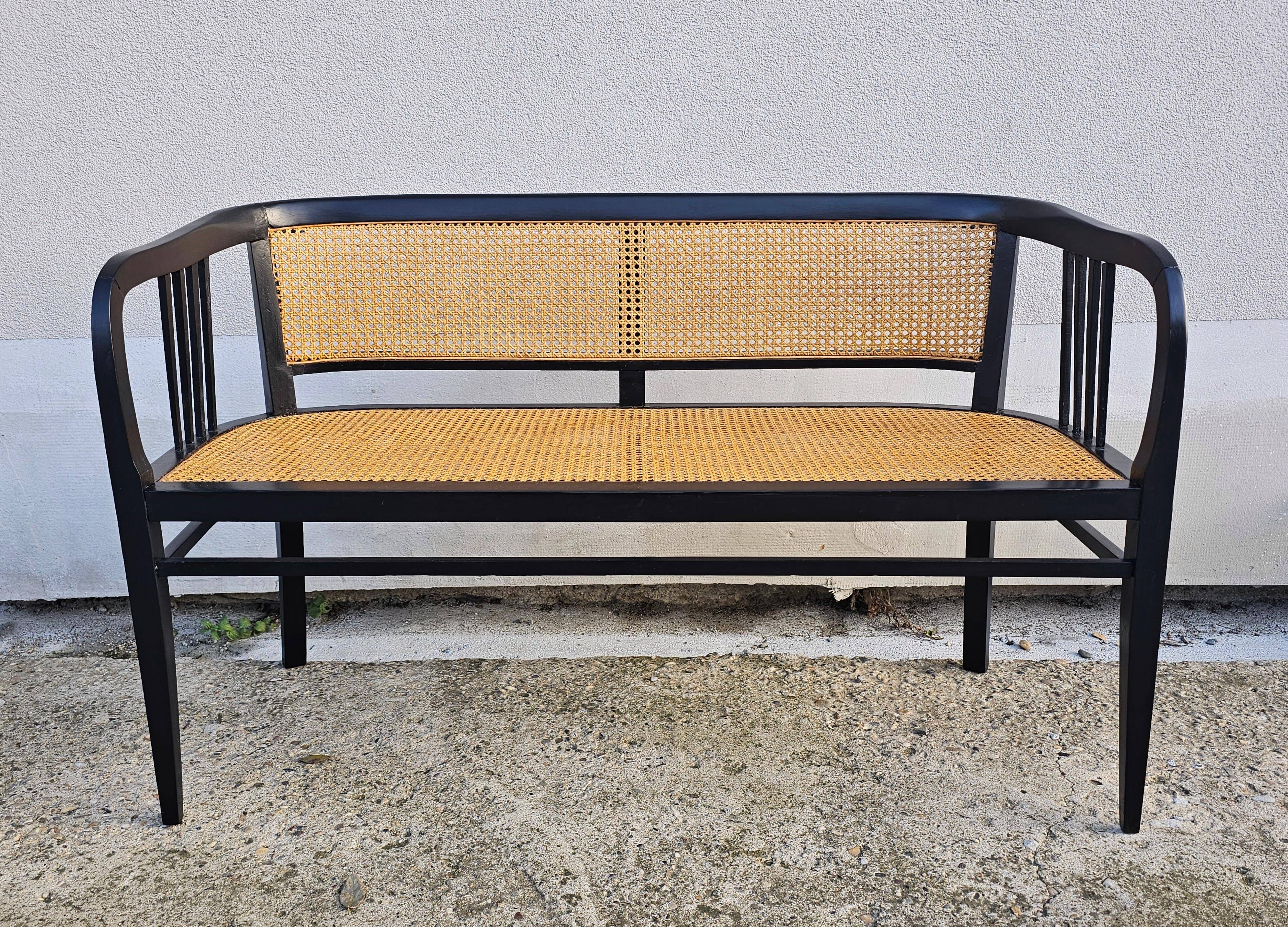 Vienna Secession beech canapé with cane seat and backrest.