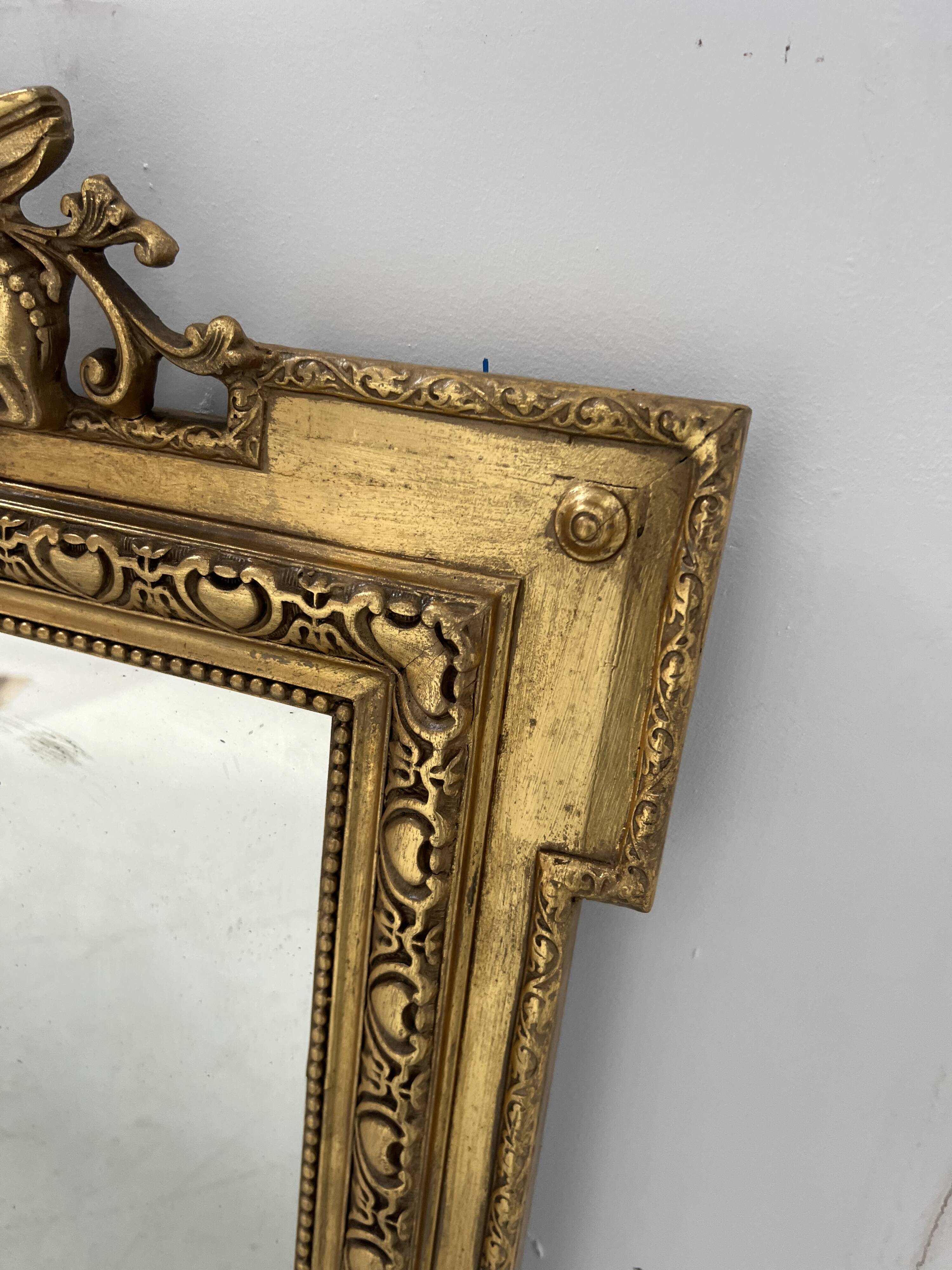 Louis XVI style mirror in wood and gilded stucco, 19th century