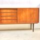 Danish teak sideboard with two sliding doors and 4 central drawers
