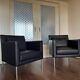 2 fauteuils de salon modernistes allemands en cuir noir et acier de Walter Knoll