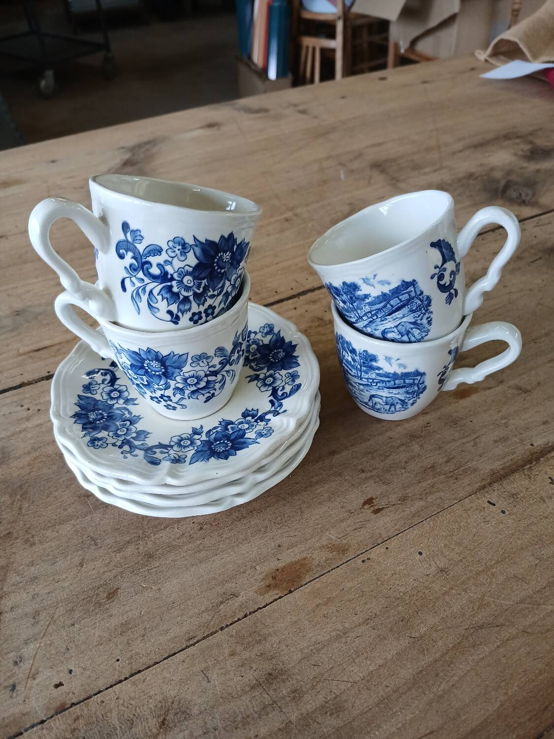 4 antique cups and saucers