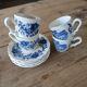4 antique cups and saucers
