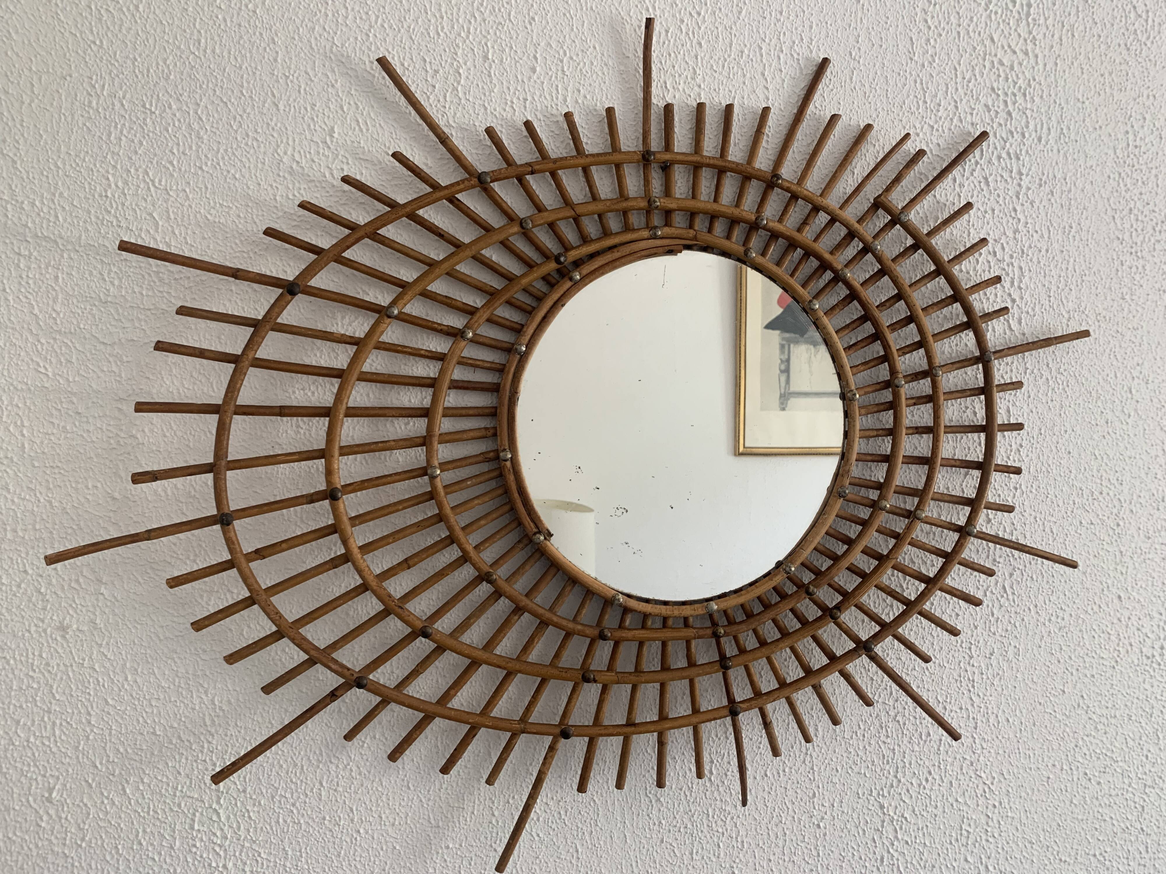 Vintage 1960s sunburst rattan ortf style spiral eye mirror - 90 x 67 cm