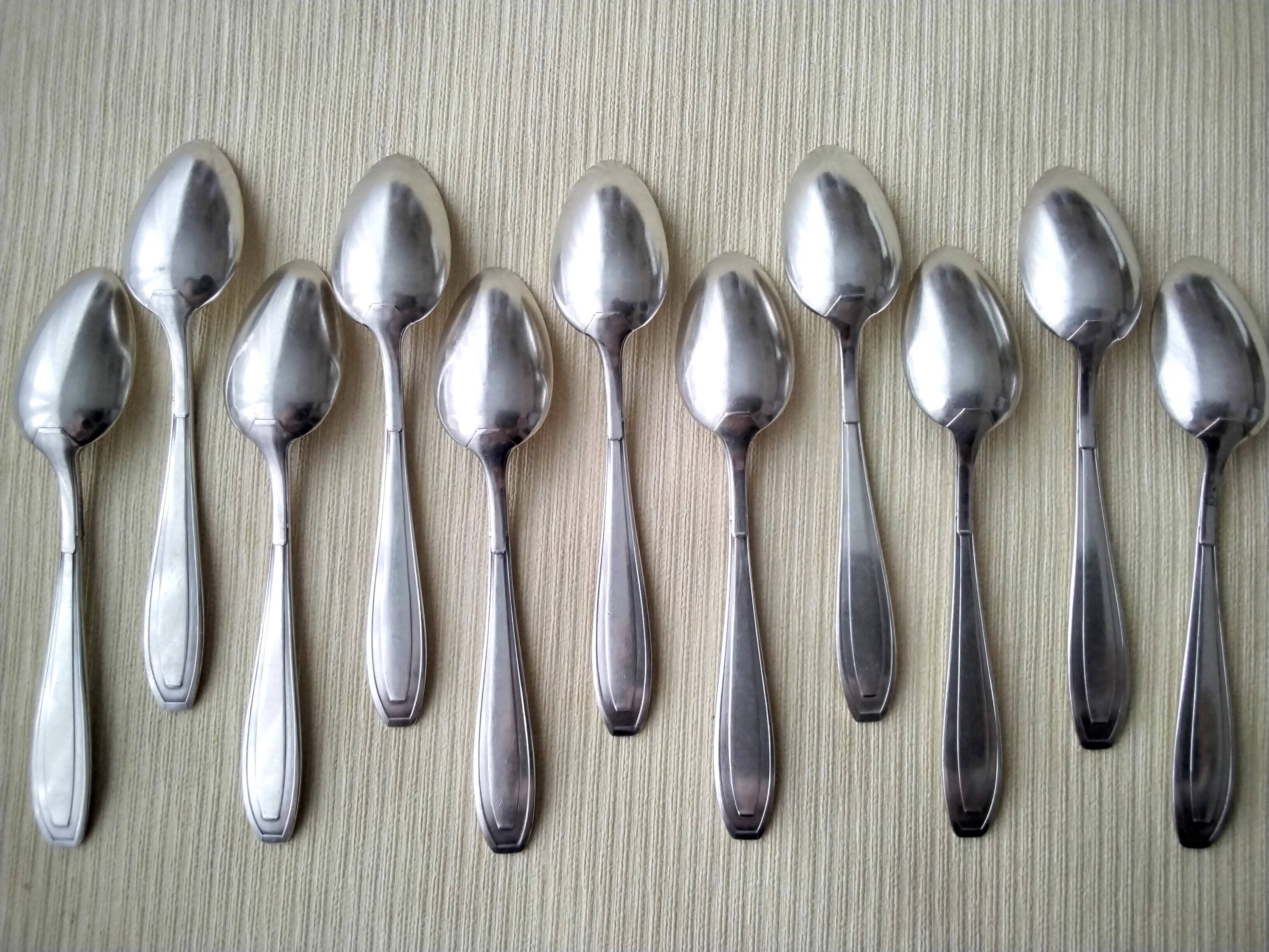 11 Cuillères à café en métal argenté Apollo
