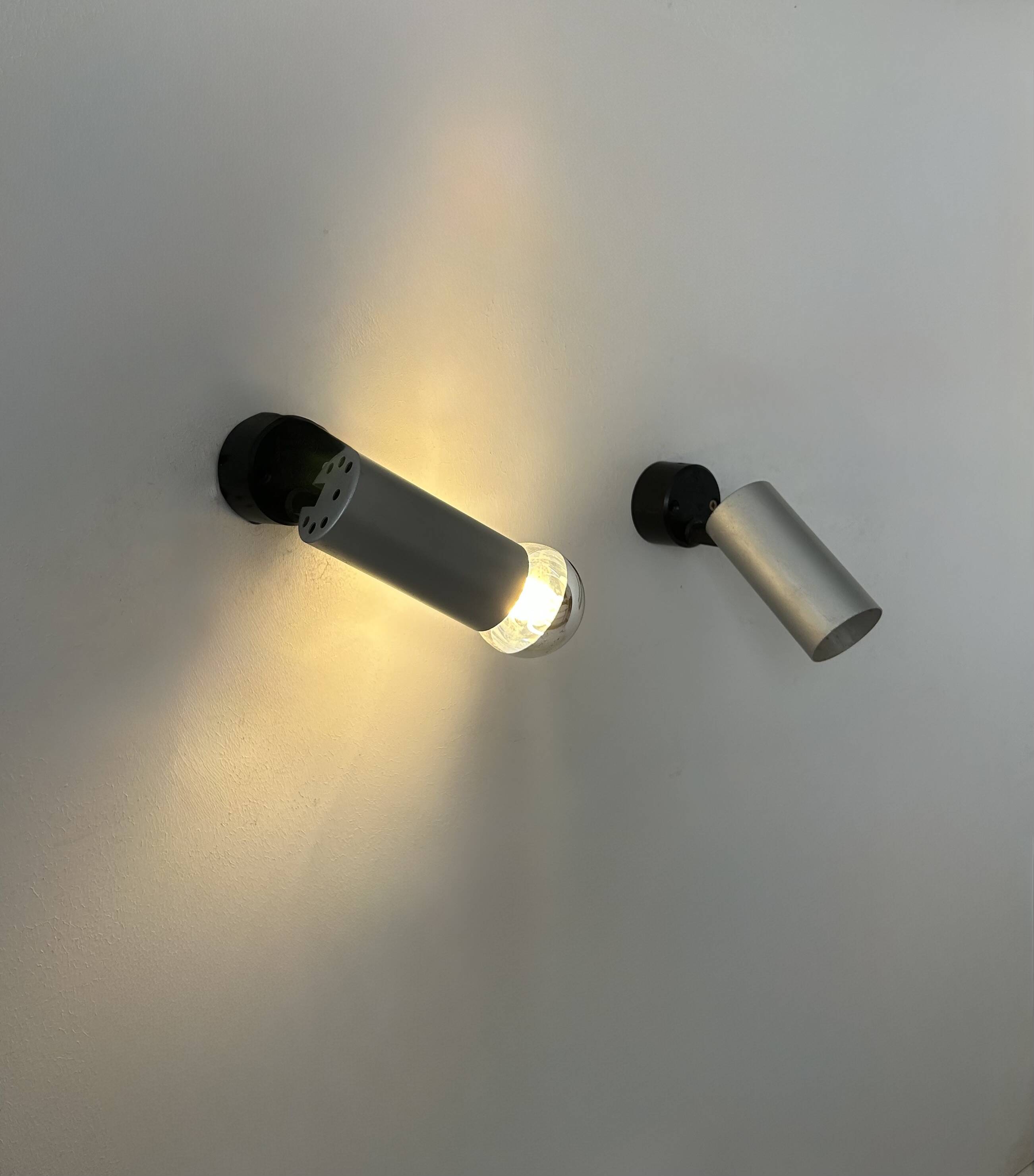 Pair of vintage adjustable brushed aluminum wall lights, France, 1970s