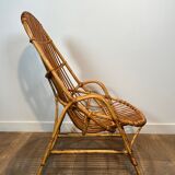 Pair of designer armchairs in rattan