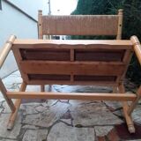 2 wooden and straw benches