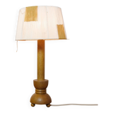 Wooden candle holder mounted as a lamp and its rope shade, 47.5cm.