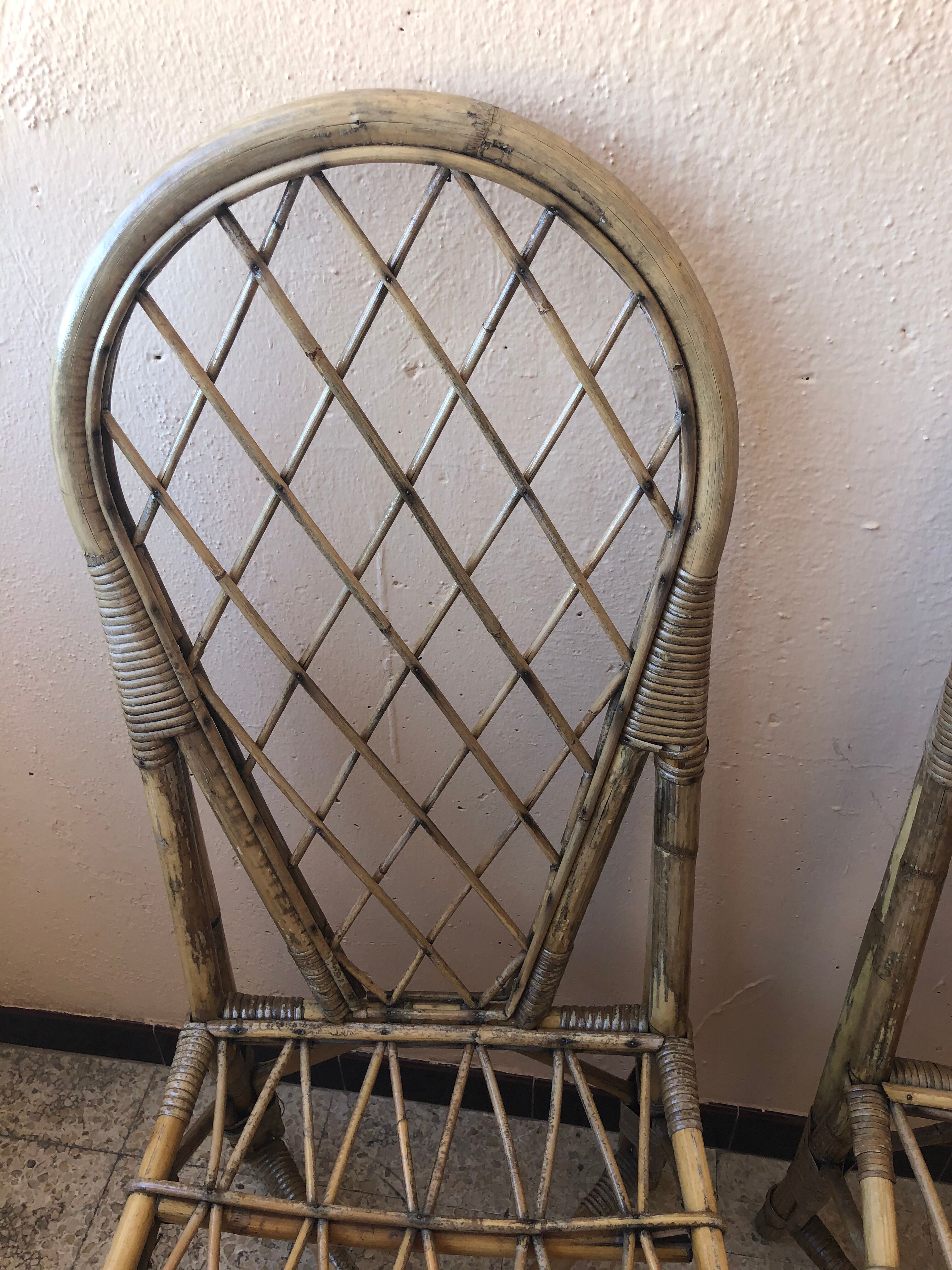 Series of 4 vintage rattan chairs