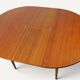 Round extendable dining table in teak – 1960s