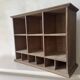 Antique commercial shelving unit with compartments