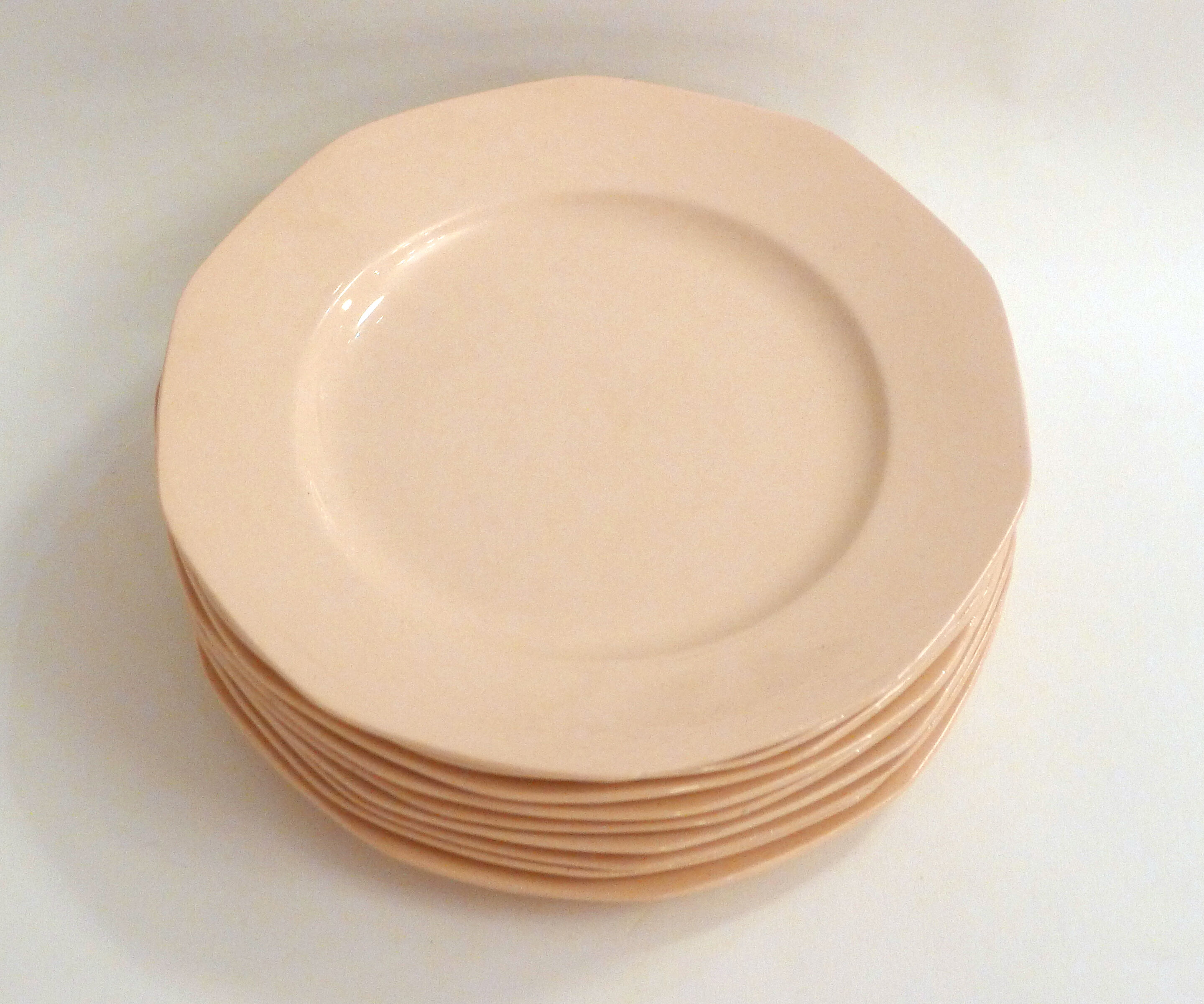 Set of 9 pink plates by Boch la Louvière