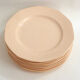 Set of 9 pink plates by Boch la Louvière