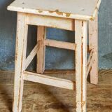Antique workshop stool in patinated solid wood