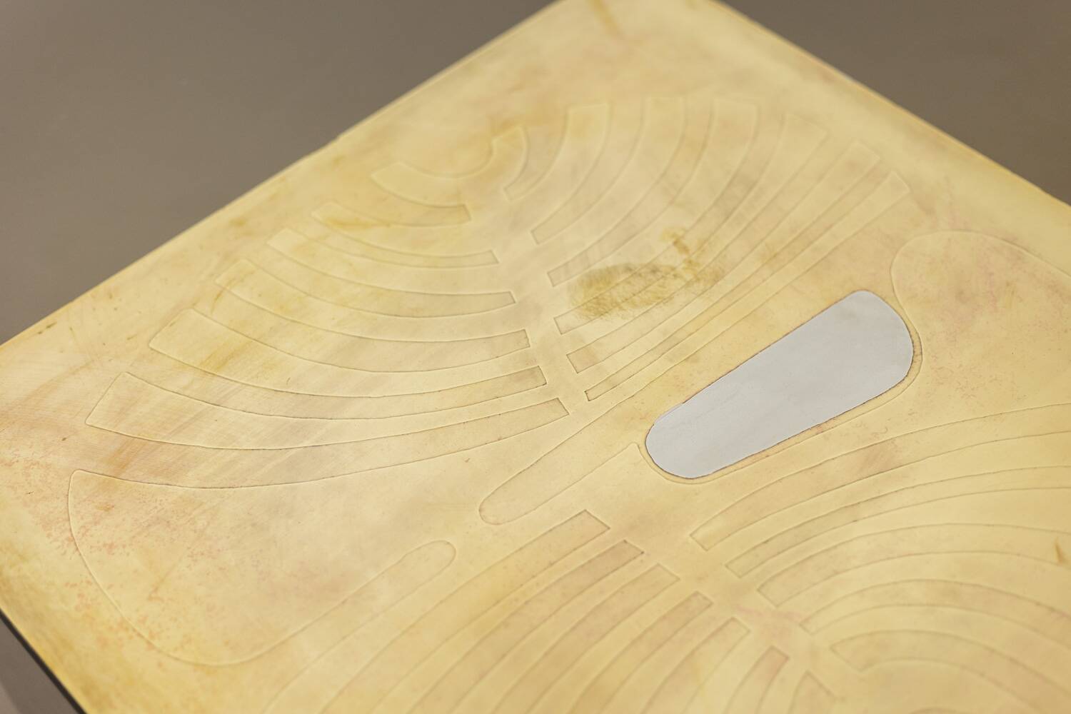 Coffee table in gilded brass and smoked glass. 1970s.