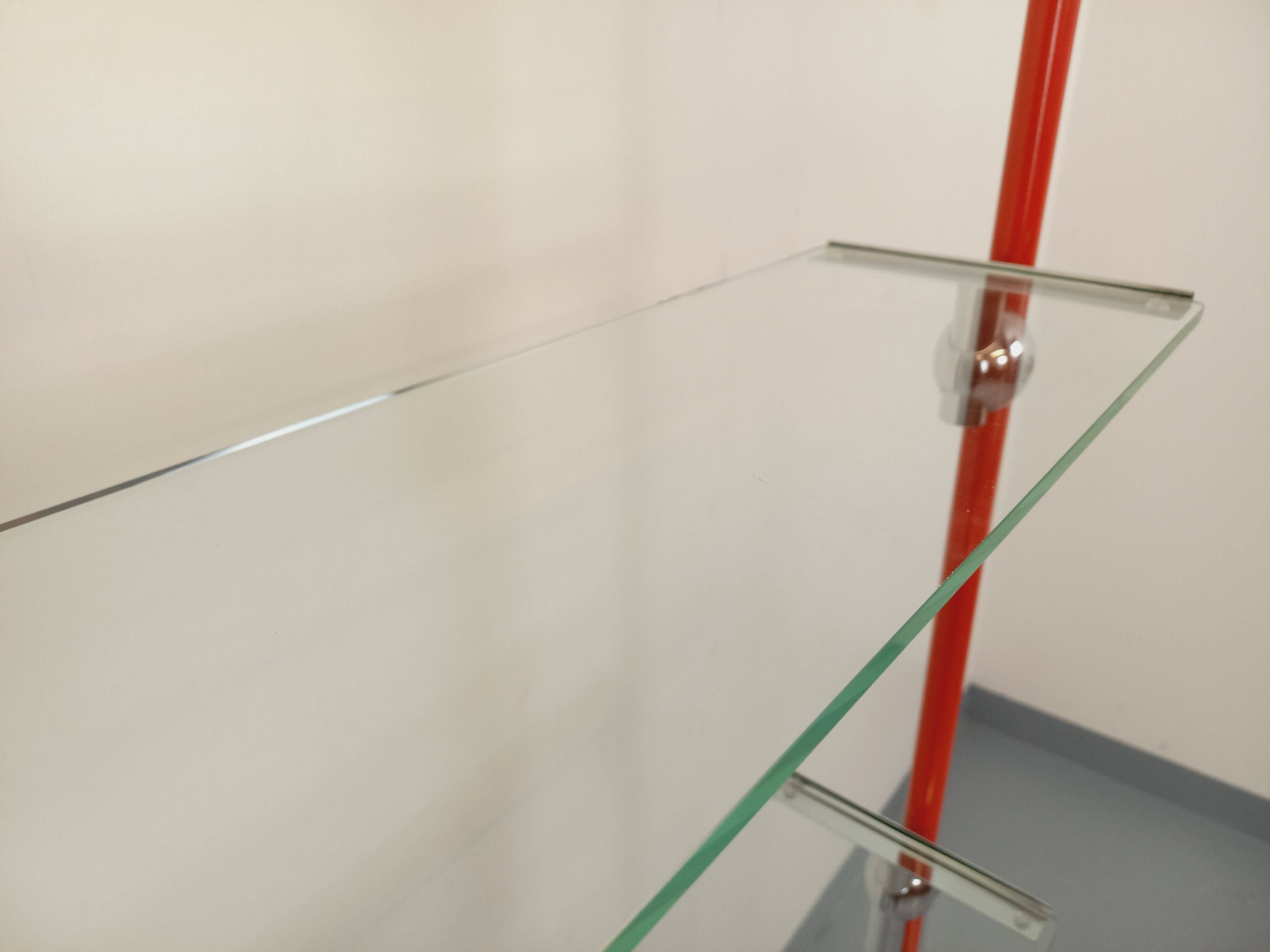 Modular bookshelf in vintage Bauhaus style, red metal, chrome.