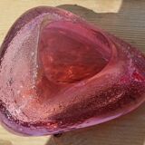 Empty pink blown glass pocket