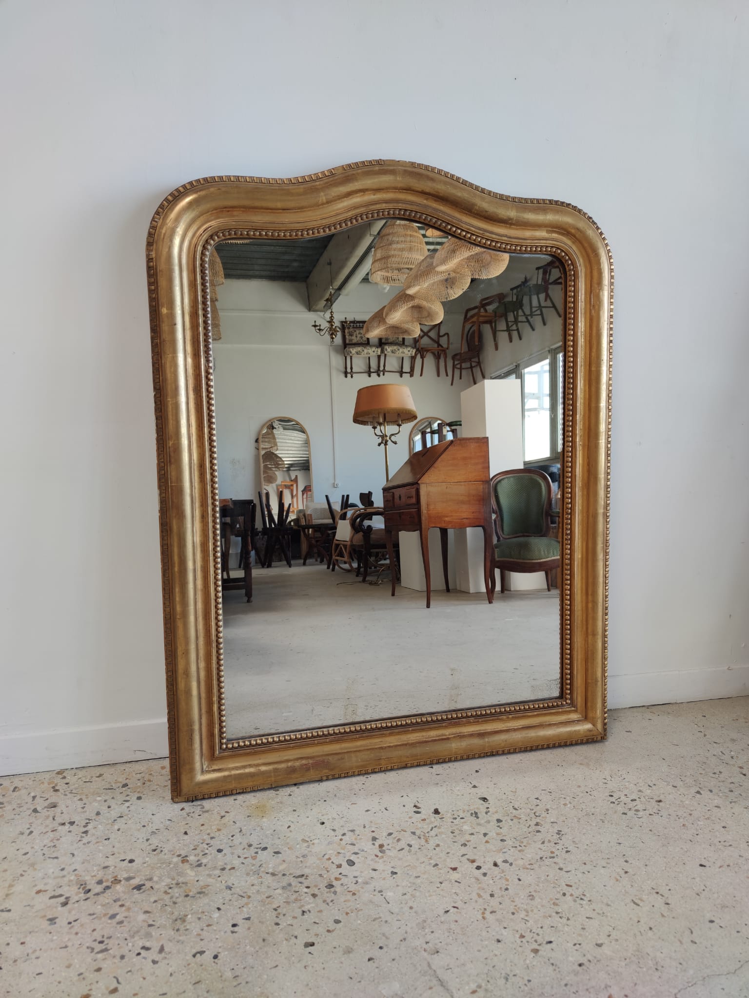 Louis Philippe gilded mirror with gendarme hat nineteenth H:130cm