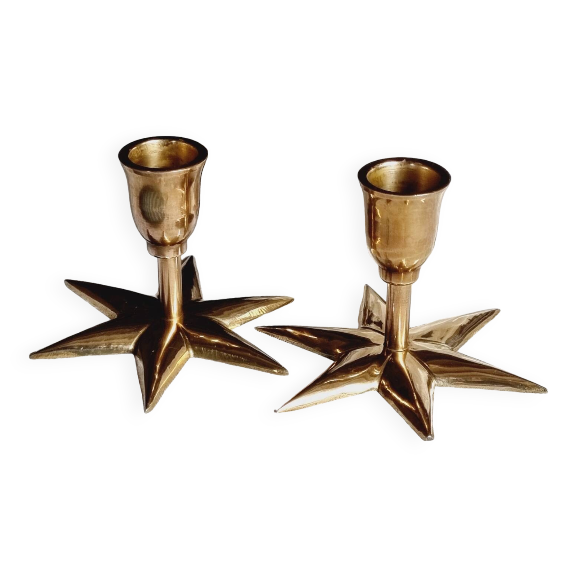 Duo of brass star candlesticks