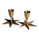 Duo of brass star candlesticks