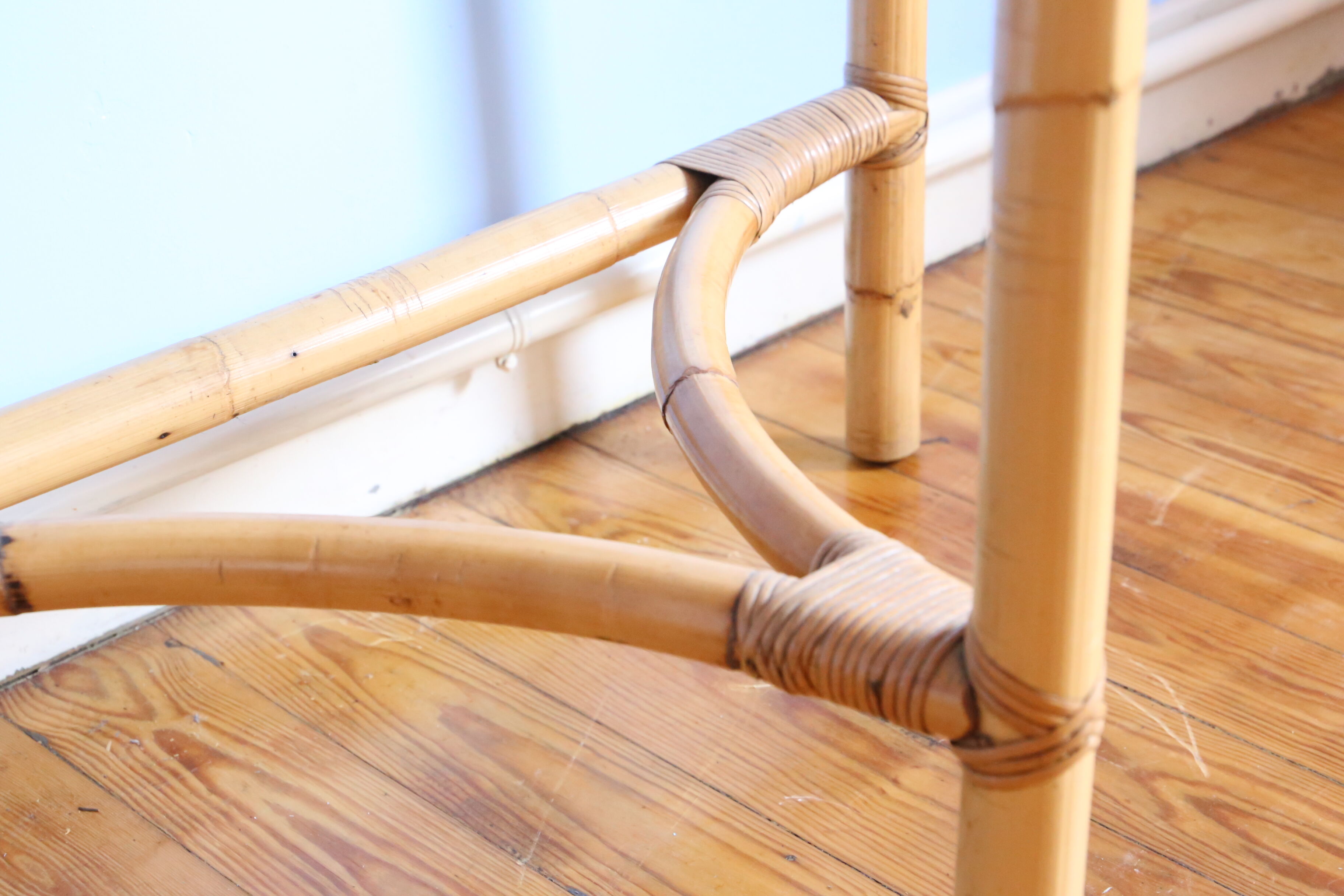 Half-moon rattan console