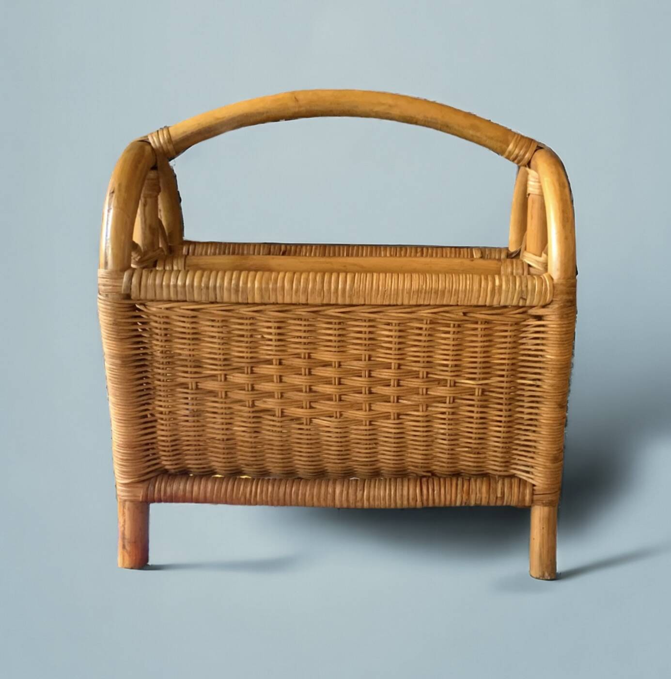 Vintage wicker and bamboo magazine rack